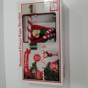 Animated candy cane‎ acrobat elf new